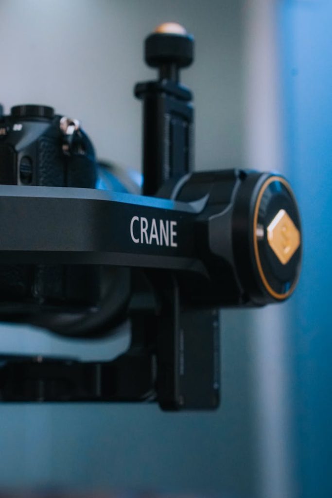 Crafting Captivating Headlines: Your awesome post title goes here Close-up of a camera mounted on a Crane gimbal for stabilization.